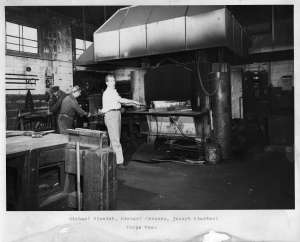 1947 - Forge Room - Michael Blondek, Michael Creanza and Joseph Stockerl making springs in the under-fired heat controlled furnace