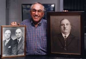 1996 - Frank L. Ferrara holding photos of his father Louis, uncle Fred and grandfather Frank P. Ferrara